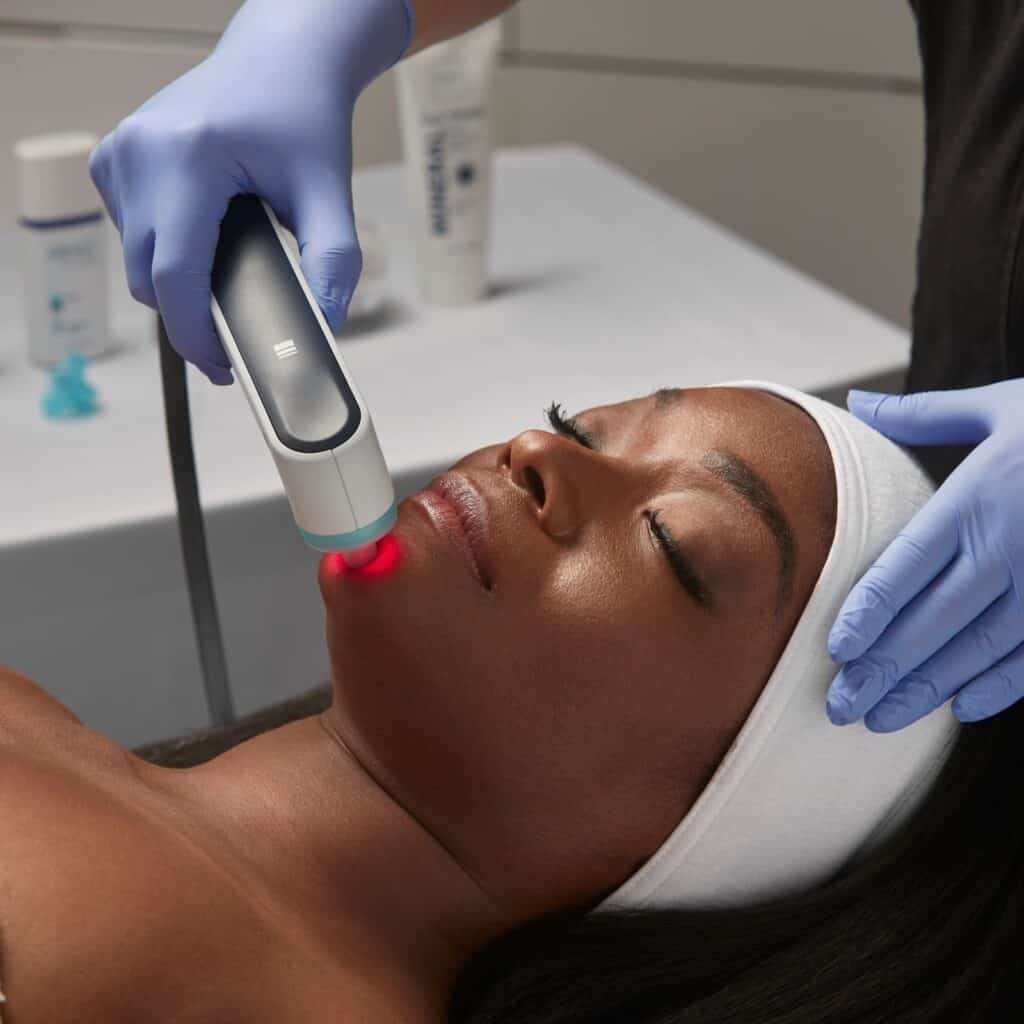 A woman having a SkinTrinsiq facial